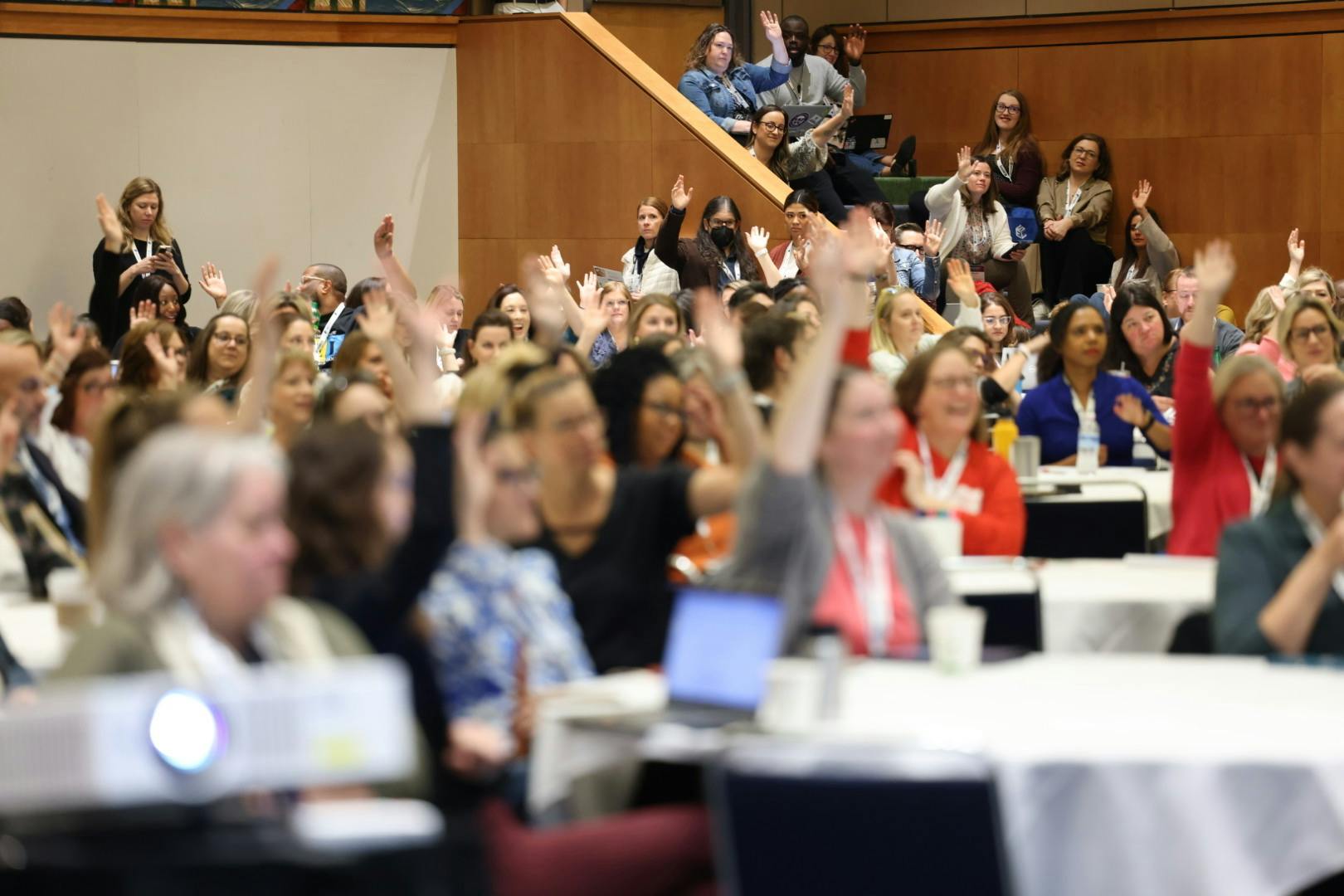 A crowded auditorium filled with people excited to learn about SEL